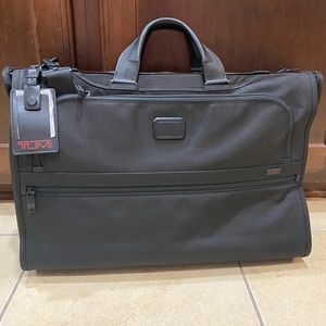 Brand new Tumi carry on!